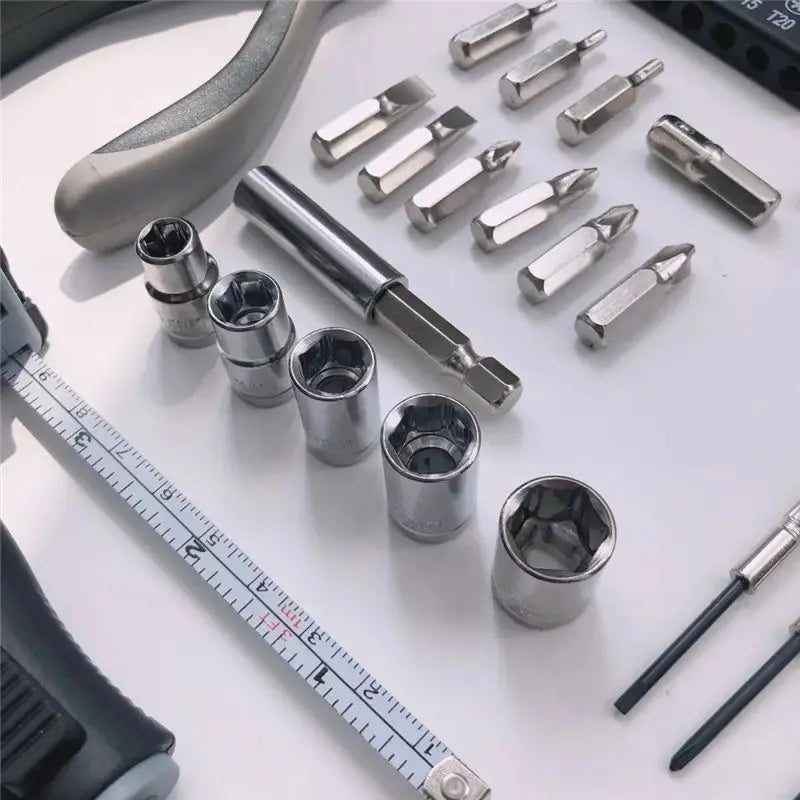 Conjunto de 27 peças de ferramentas manuais para reparo de máquinas, incluindo caixa de lata, relógio de carro, ferramentas digitais, chaves de fenda, alicates e muito mais.