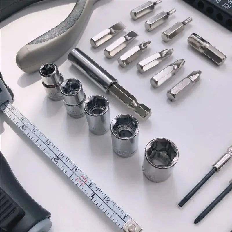 Conjunto de 27 peças de ferramentas manuais para reparo de máquinas, incluindo caixa de lata, relógio de carro, ferramentas digitais, chaves de fenda, alicates e muito mais.